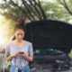 Millenial woman calling insurance to discuss roadside assistance coverage